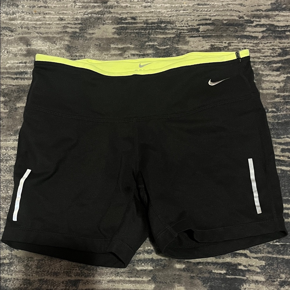 Nike Women's Black Shorts with Yellow and White Accents